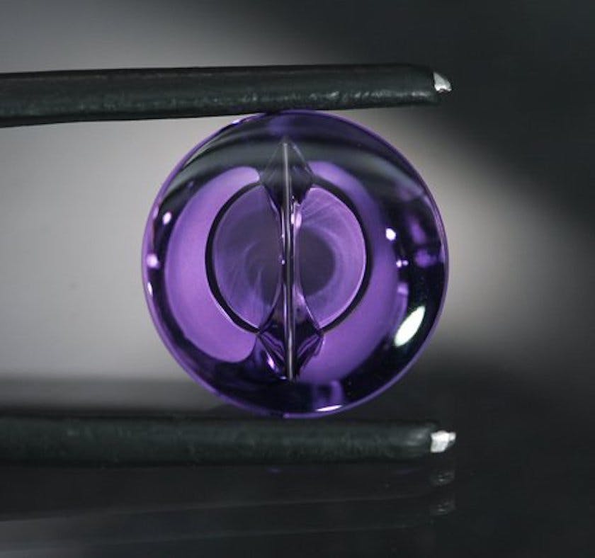 Natural Radiation and Gemstone Color